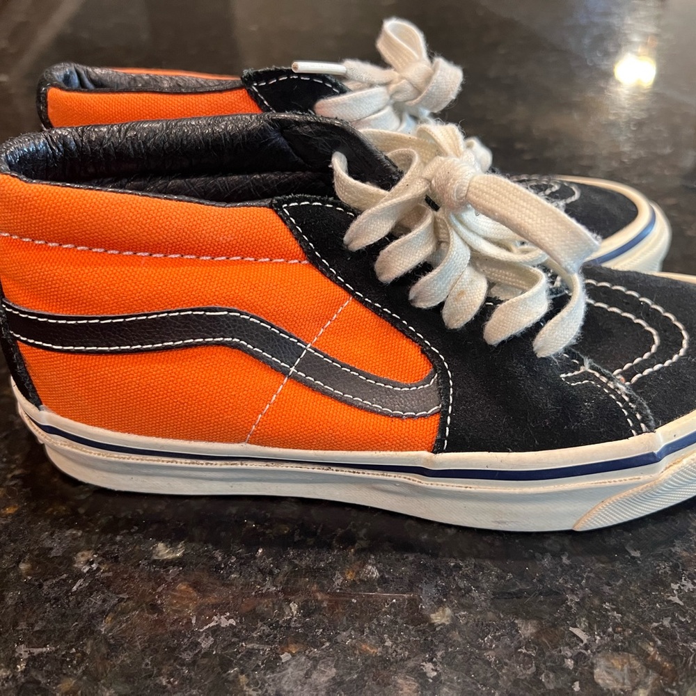 VANS Men size 4 pumpkin orange and black high top shoes in like-new condition.